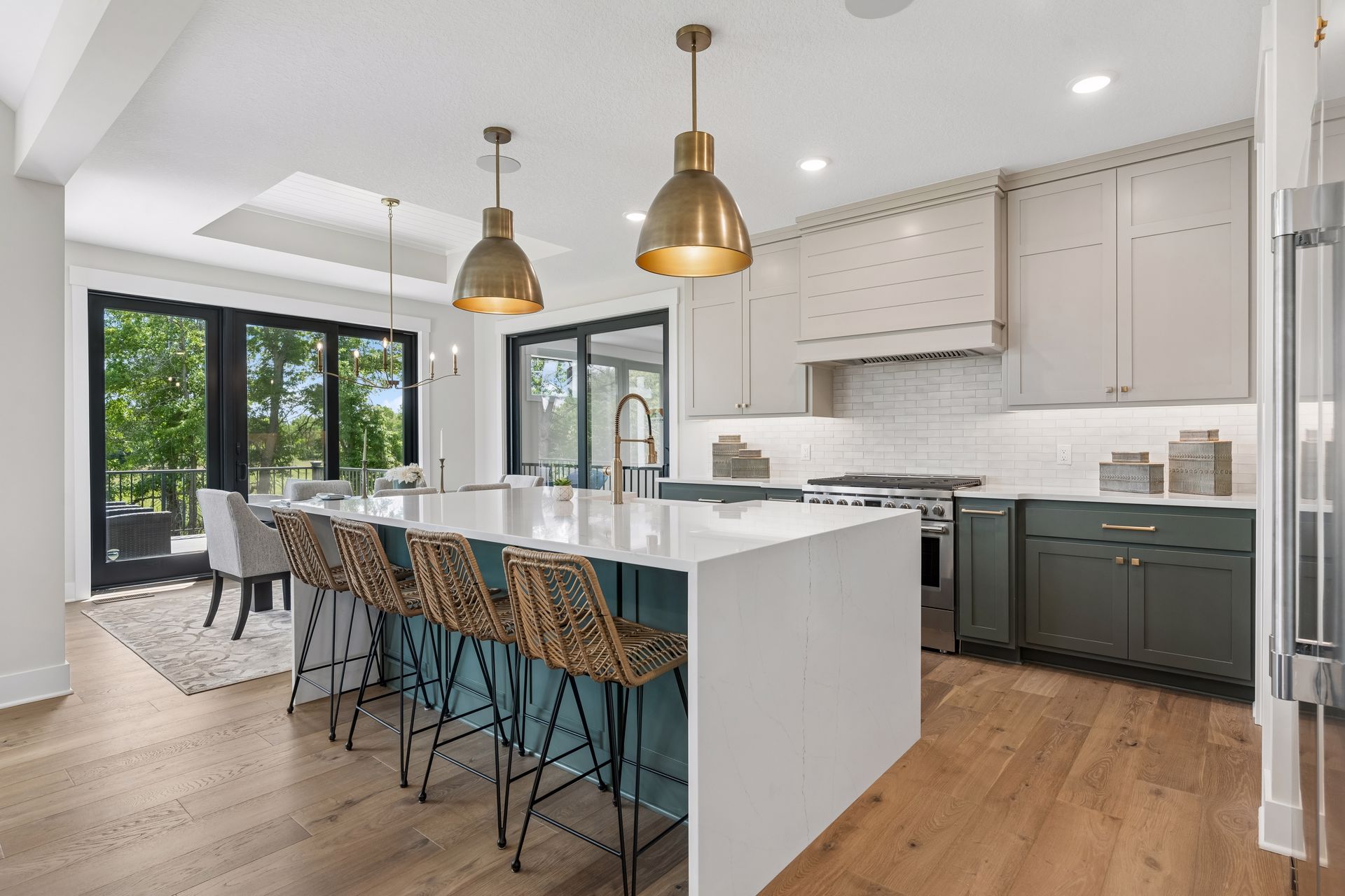 Luxury kitchen with oversized quartz island and custom cabinetry